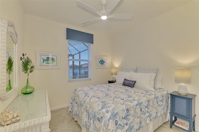 tiled bedroom with ceiling fan