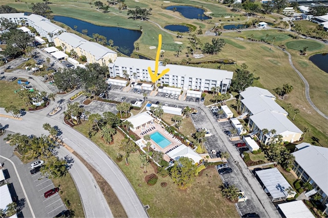 bird's eye view with a water view