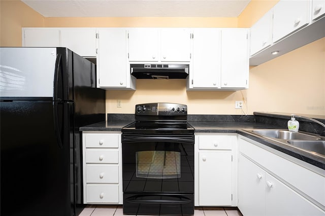 kitchen featuring light tile patterned floors, black appliances, sink, and white cabinets