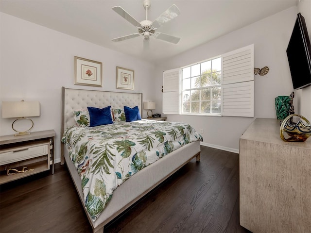 bedroom featuring dark hardwood / wood-style floors and ceiling fan