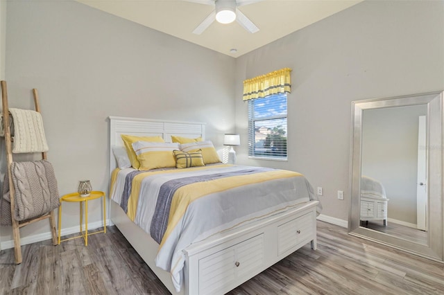 bedroom featuring ceiling fan and hardwood / wood-style floors