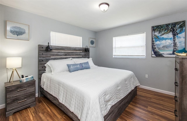 bedroom featuring dark wood-type flooring