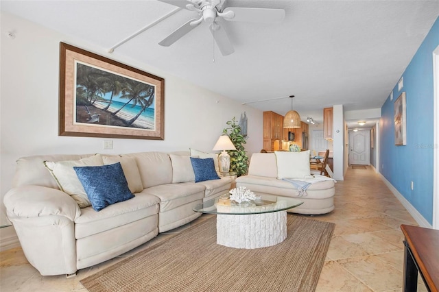 living room featuring ceiling fan