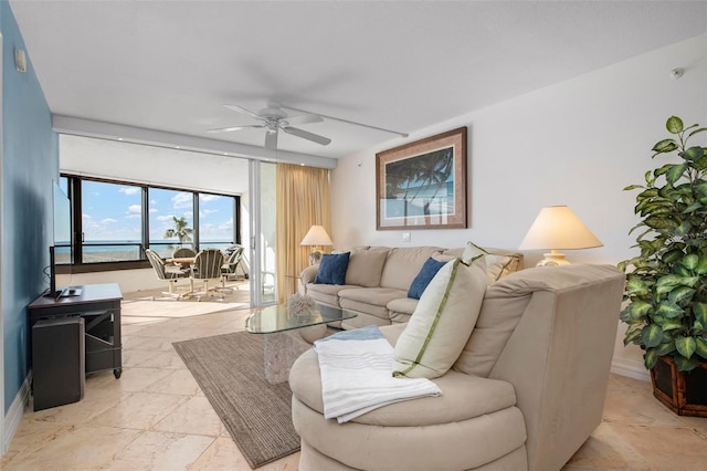 living room featuring ceiling fan