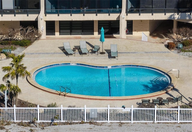 view of pool featuring a patio