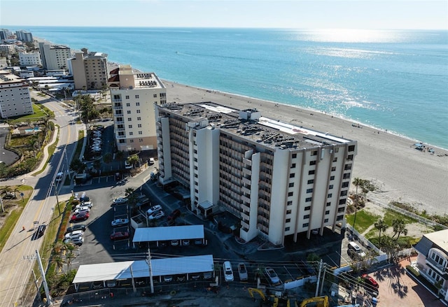 aerial view featuring a beach view and a water view