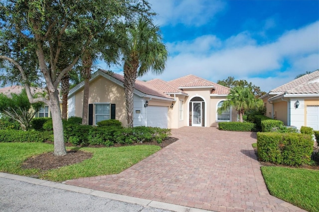 view of front of property featuring a garage