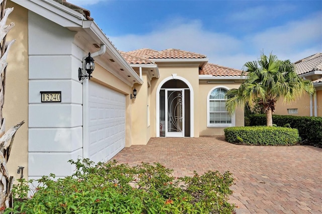 entrance to property with a garage