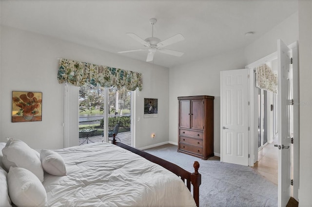 carpeted bedroom featuring ceiling fan and access to exterior