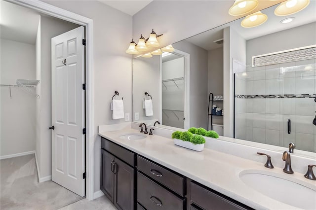 bathroom with vanity and an enclosed shower