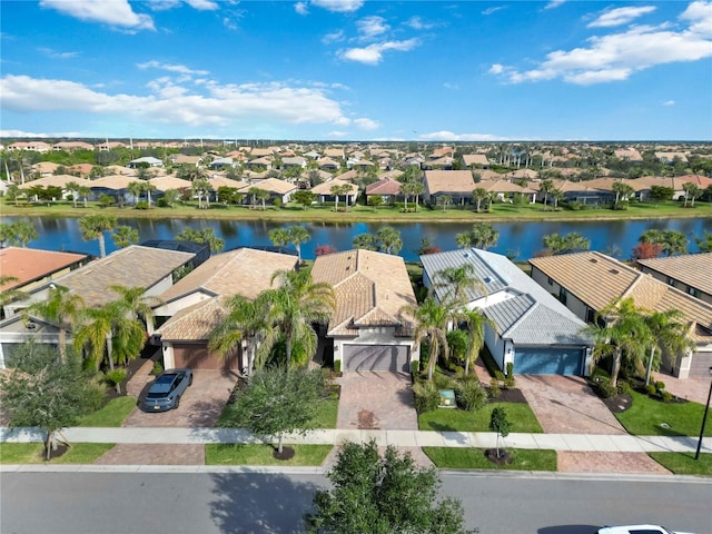 bird's eye view with a water view