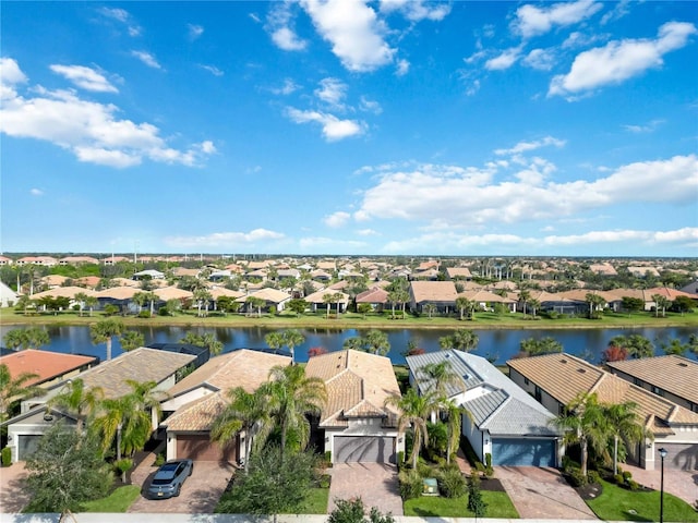 bird's eye view with a water view