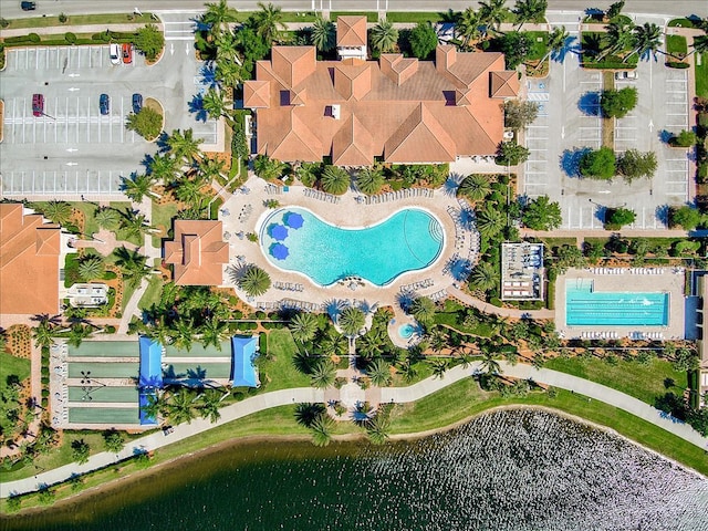 birds eye view of property featuring a water view