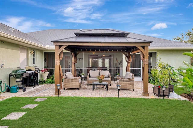 back of property featuring an outdoor living space, a gazebo, a yard, and a patio