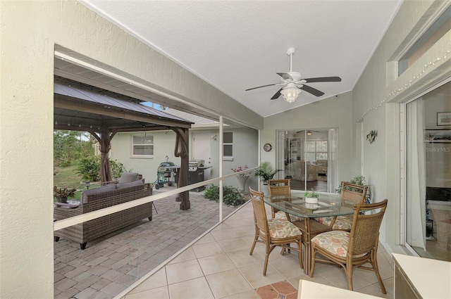 view of patio / terrace with ceiling fan and outdoor lounge area