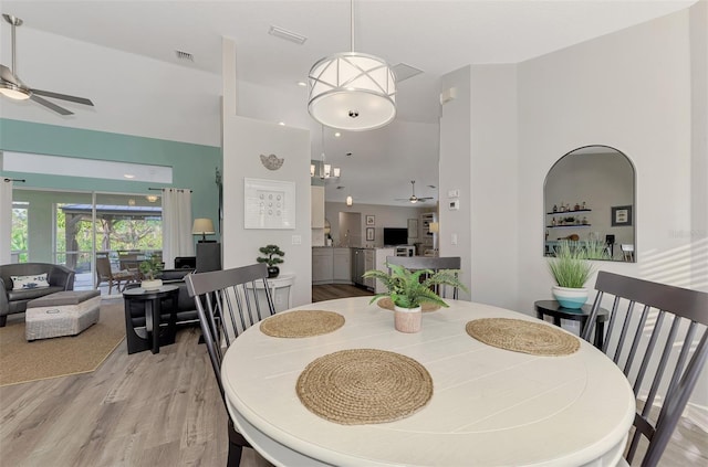 dining area featuring ceiling fan and light hardwood / wood-style floors