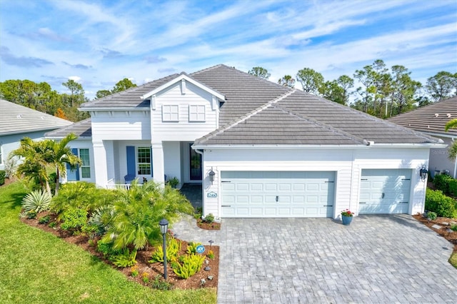 view of front of property with a garage