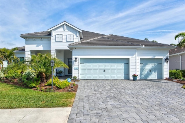 view of front of home with a garage