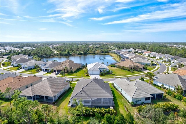 drone / aerial view with a water view