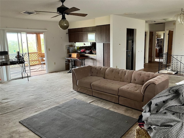 living room featuring ceiling fan