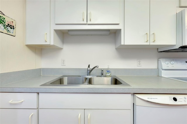 kitchen with sink, white cabinetry, and dishwasher