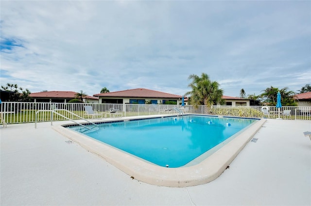 view of pool with a patio area