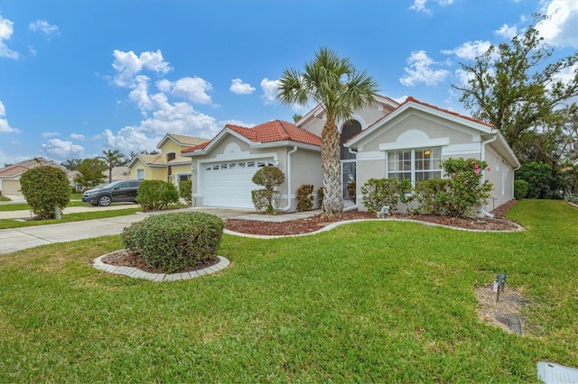 view of front of home featuring a garage and a front yard