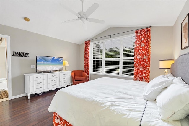 bedroom with ceiling fan, dark hardwood / wood-style flooring, and lofted ceiling