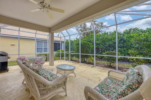 sunroom / solarium featuring ceiling fan and a healthy amount of sunlight