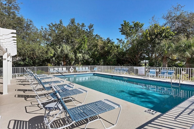 view of pool featuring a patio