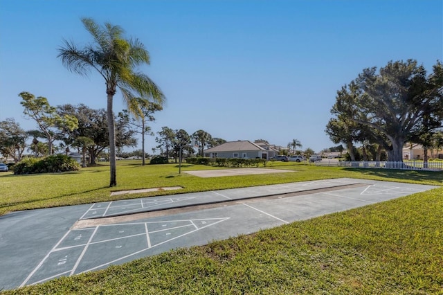 view of community featuring a yard