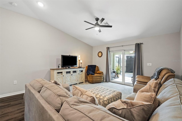 living room featuring vaulted ceiling, ceiling fan, and dark hardwood / wood-style flooring