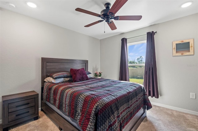 carpeted bedroom with ceiling fan