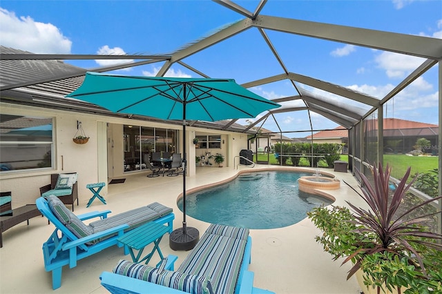 view of pool featuring glass enclosure, a patio, and a jacuzzi