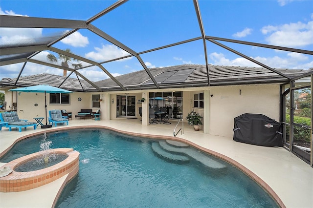 view of pool featuring glass enclosure, an in ground hot tub, a patio, and grilling area