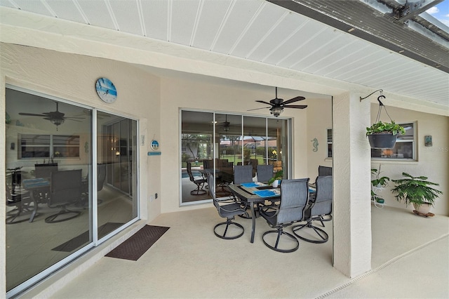 view of patio featuring ceiling fan