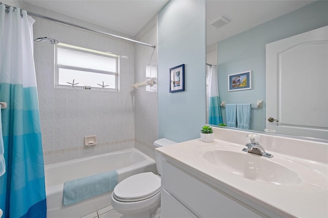 full bathroom with toilet, vanity, tile patterned floors, and shower / tub combo with curtain