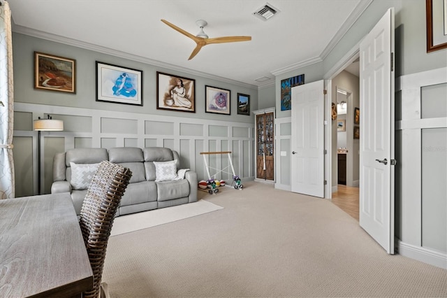 interior space featuring crown molding and ceiling fan