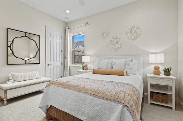 bedroom featuring ceiling fan and carpet floors