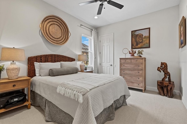 carpeted bedroom featuring ceiling fan