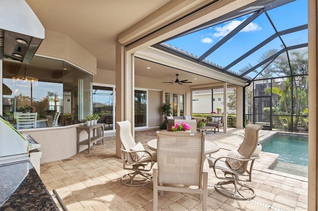 view of patio / terrace featuring ceiling fan, an outdoor living space, and a lanai