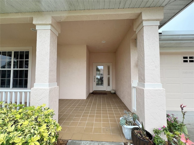 property entrance with a garage