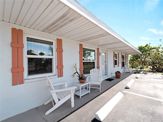 1423 Avenida Del Circo Unit 1C, Venice, FL 34285 - view of patio / terrace with covered porch