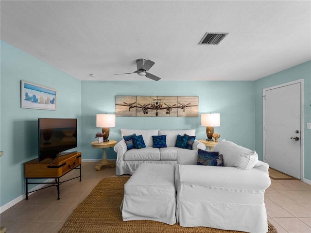 1423 Avenida Del Circo Unit 1C, Venice, FL 34285 - bedroom featuring light tile patterned flooring, baseboards, and ceiling fan