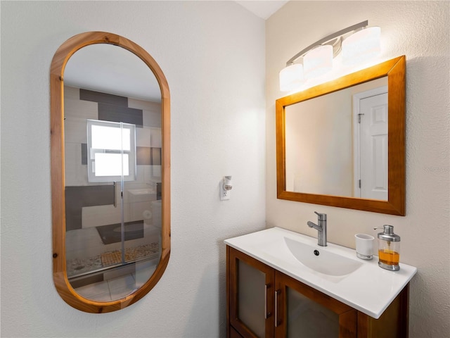 1423 Avenida Del Circo Unit 1C, Venice, FL 34285 - full bathroom featuring a shower stall and vanity