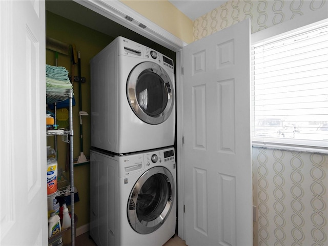 1423 Avenida Del Circo Unit 1C, Venice, FL 34285 - laundry room with stacked washer and clothes dryer