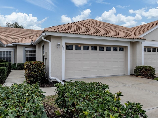 view of side of property featuring a garage