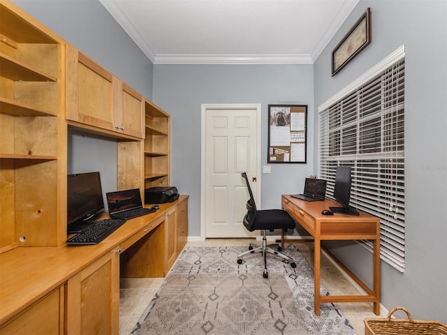 home office featuring crown molding, built in desk, and light tile patterned flooring