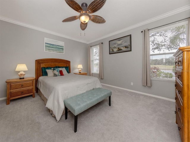 bedroom featuring light carpet, multiple windows, ornamental molding, and ceiling fan