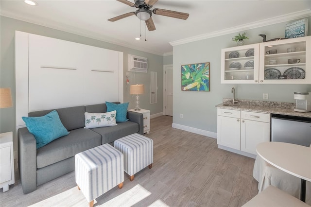 living room featuring a wall mounted air conditioner, indoor bar, ceiling fan, crown molding, and light hardwood / wood-style flooring